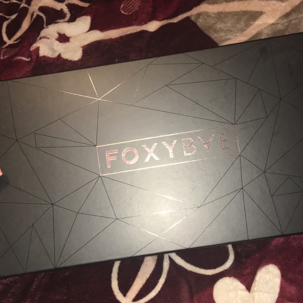 Selling foxybae rose gold curling iron
